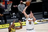 Nikola Jokic #15 of the Denver Nuggets puts up a shot.